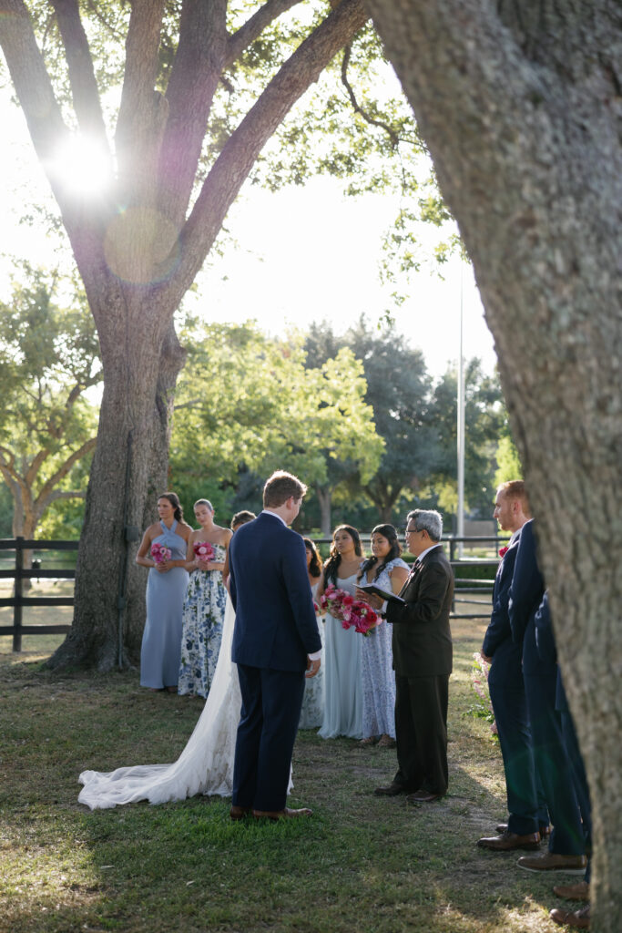 Outdoor summer Texas wedding at the Sandlewood manor estate venue.